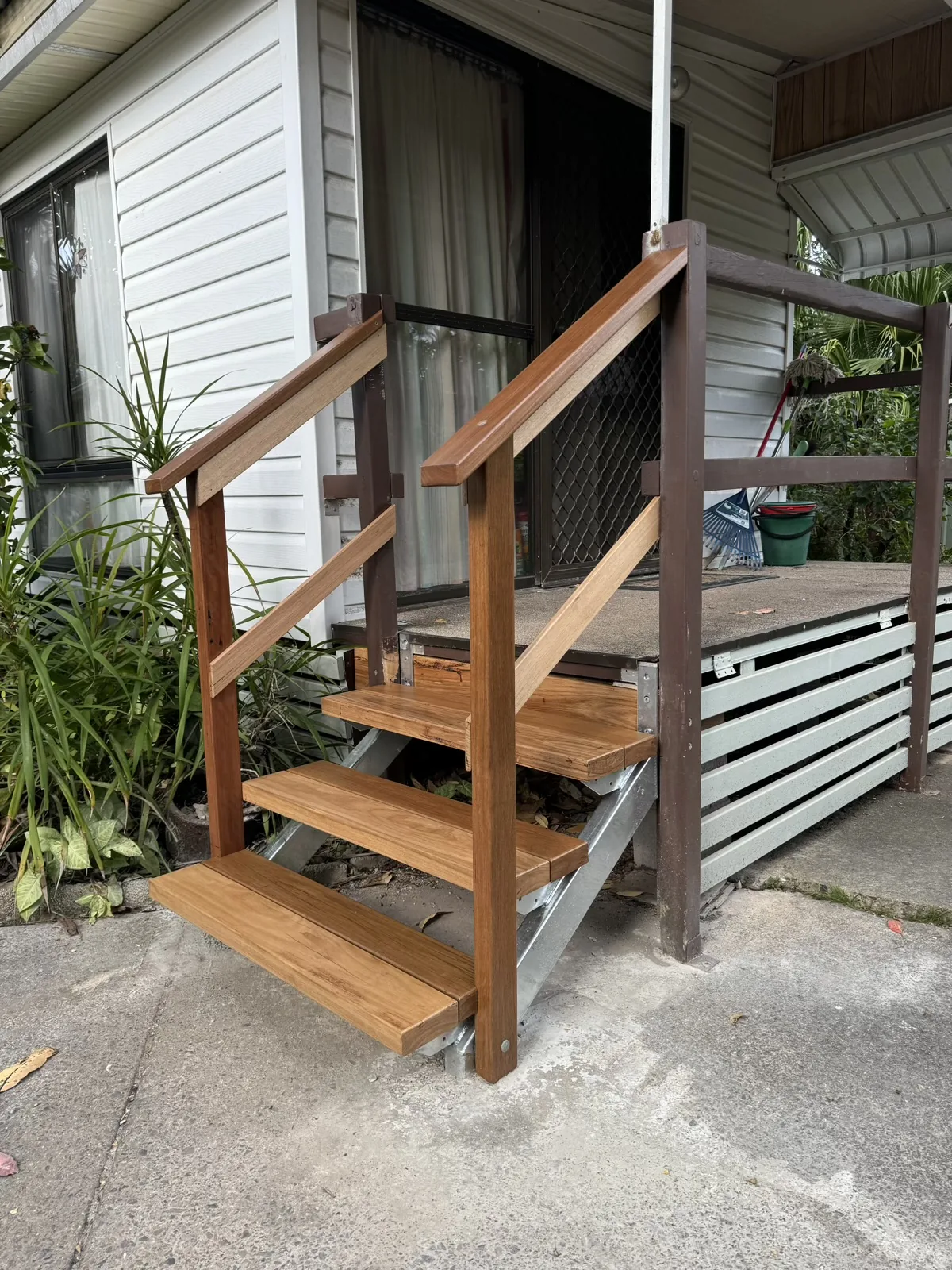 Finished timber entry stairs and handrails